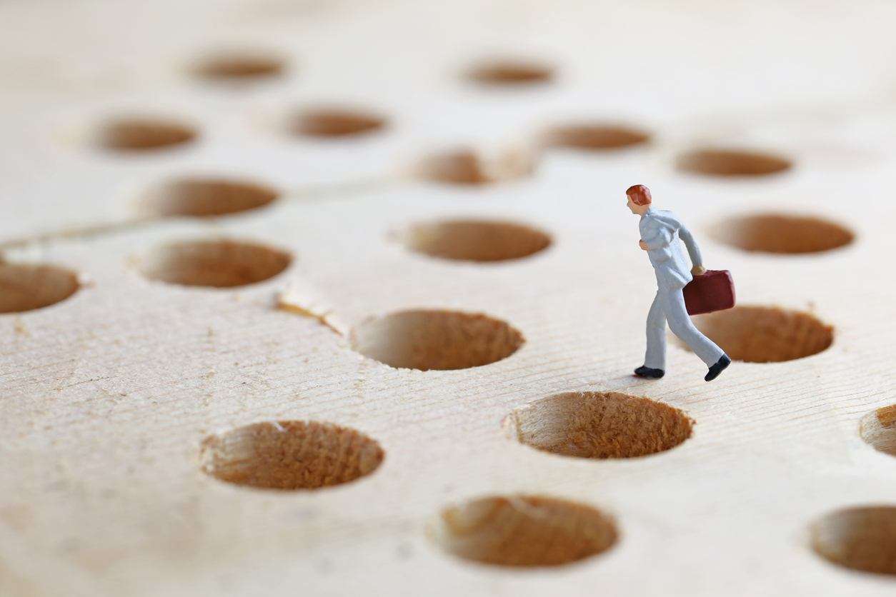 Businessmen of the pitfalls and miniature