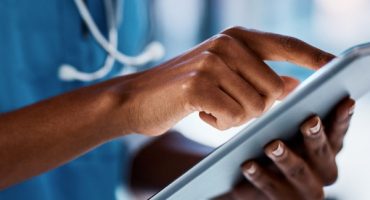 Doctor using a touch screen